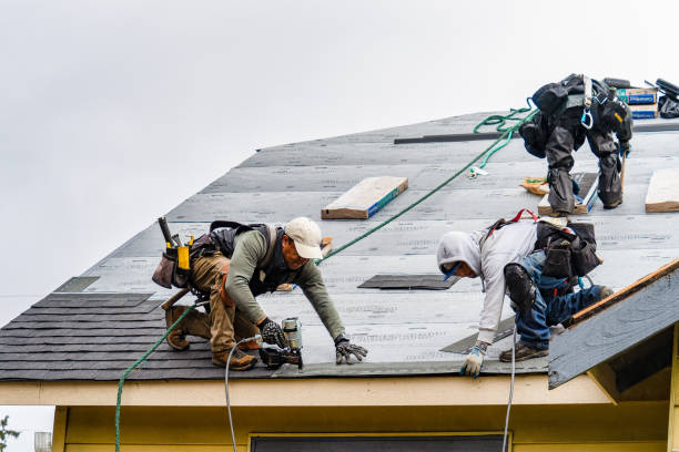 Professional Roofing technician working in Boothbay Harbor, ME